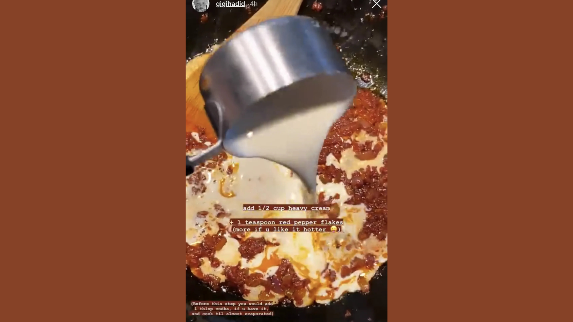 heavy cream poured into tomato paste and red pepper flakes