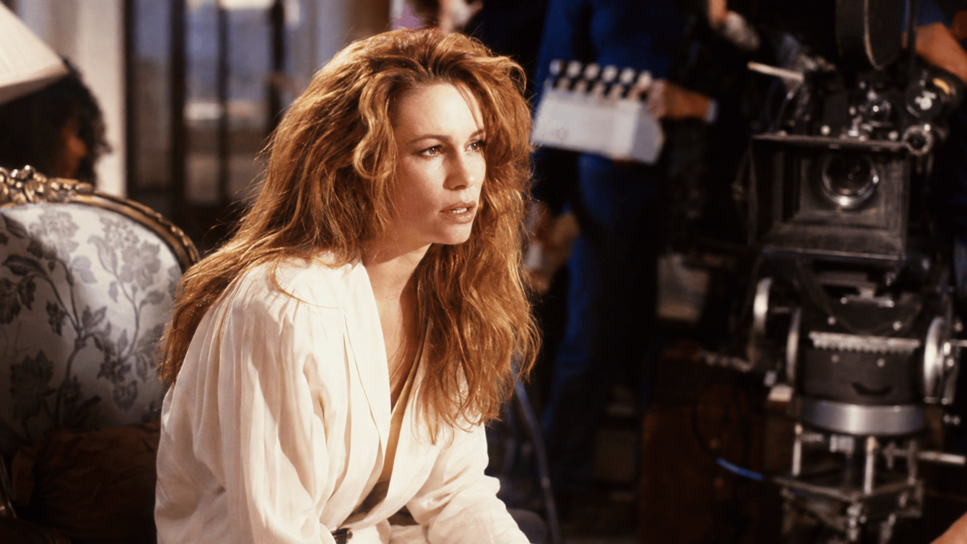 tawny kitaen performing a dramatic scene on a professional 1980s film set