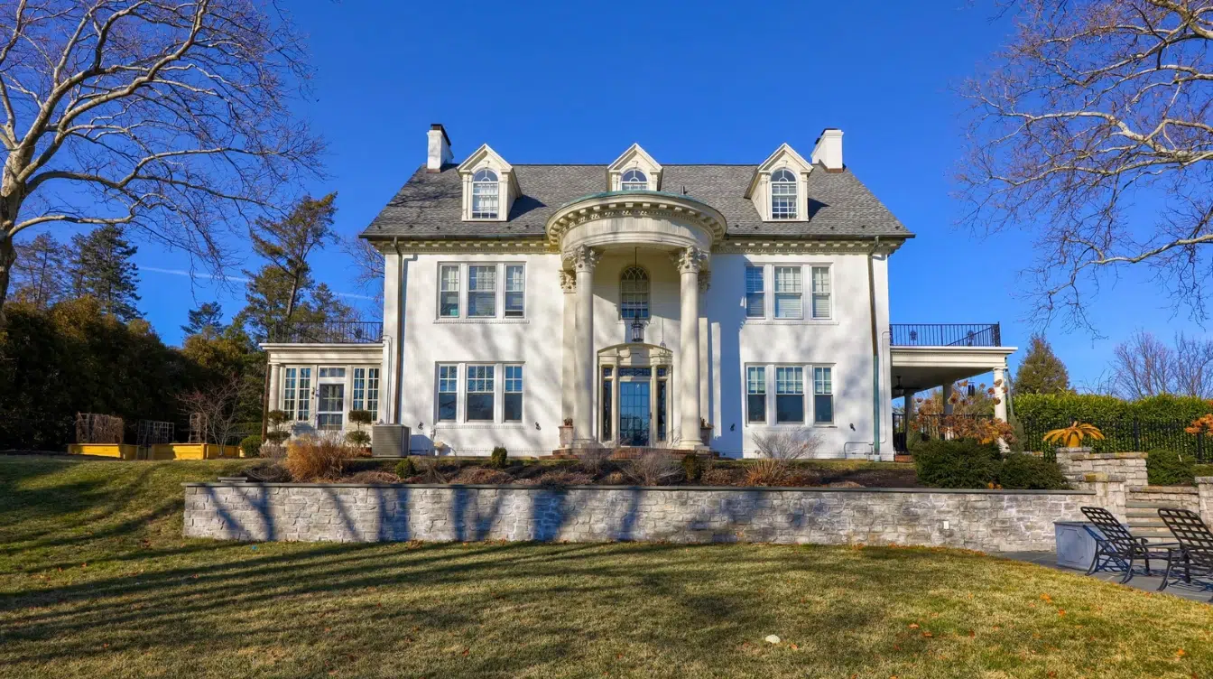 taylor swifts wyomissing childhood home in pennsylvania with white georgian colonial architecture tall columns and a landscaped lawn