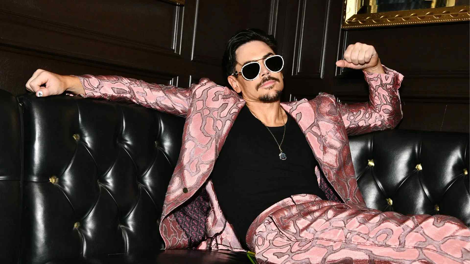 Tom Sandoval performing on stage during a live music appearance