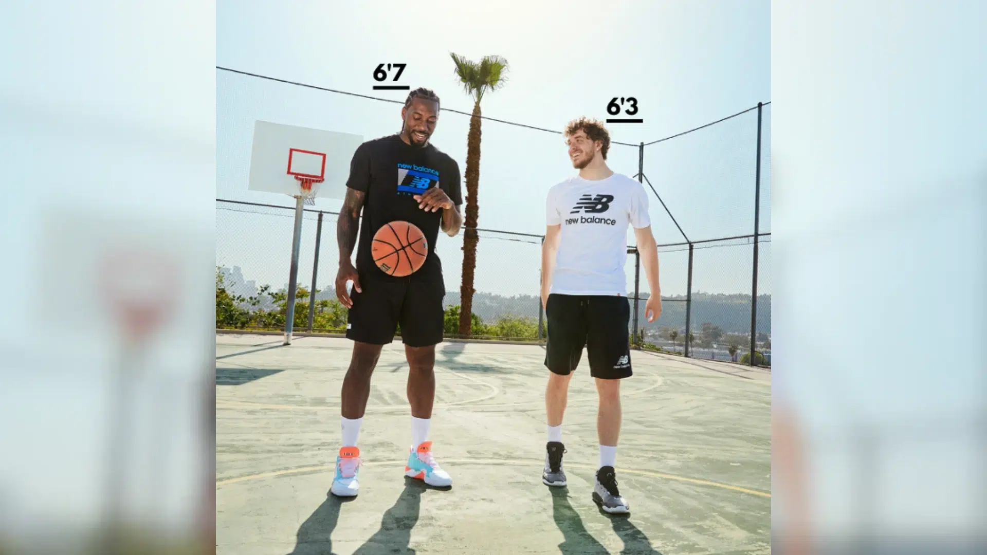 two men standing on a basketball court with height labels showing six foot seven and six foot three