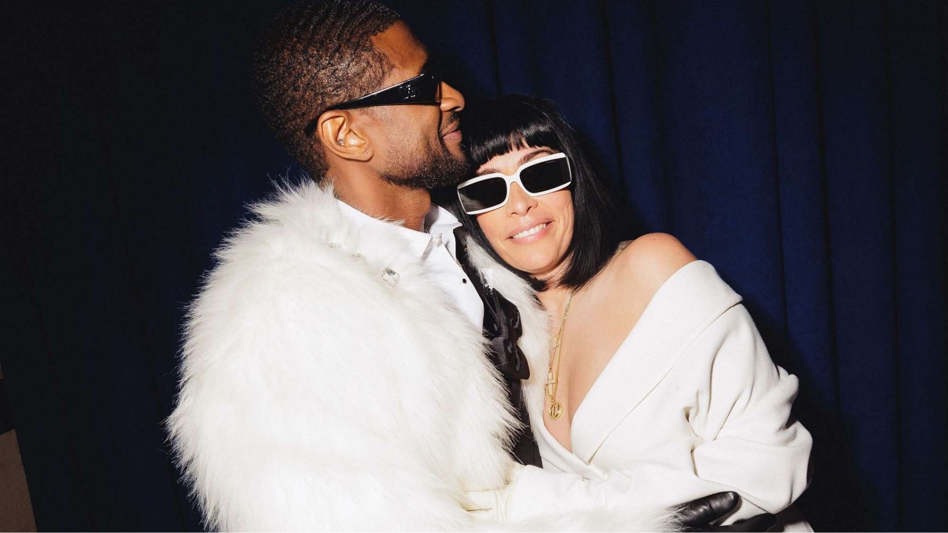 usher with wife Jennifer Goicoechea