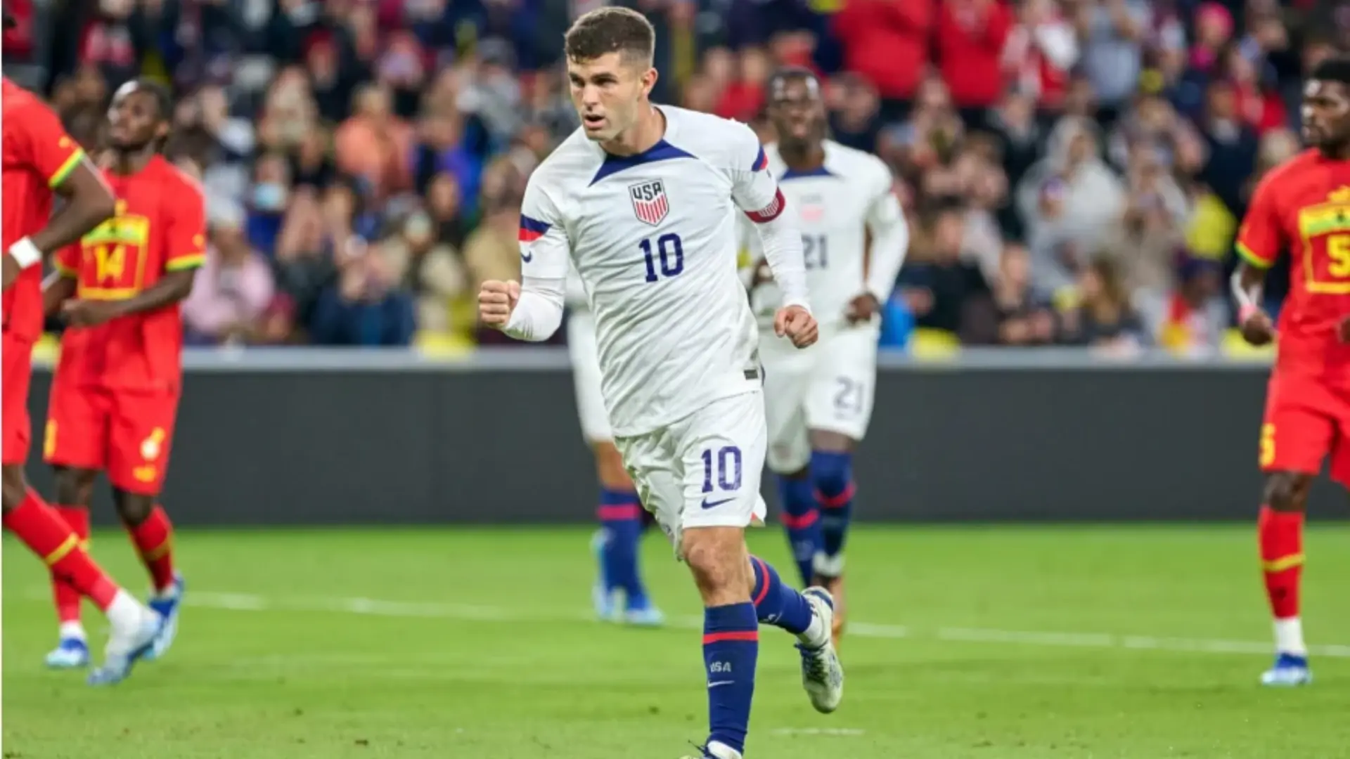 christian pulisic playing for the united states national team during an international match