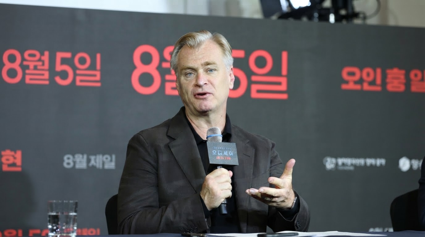 Christopher Nolan attending a film premiere during his directing career