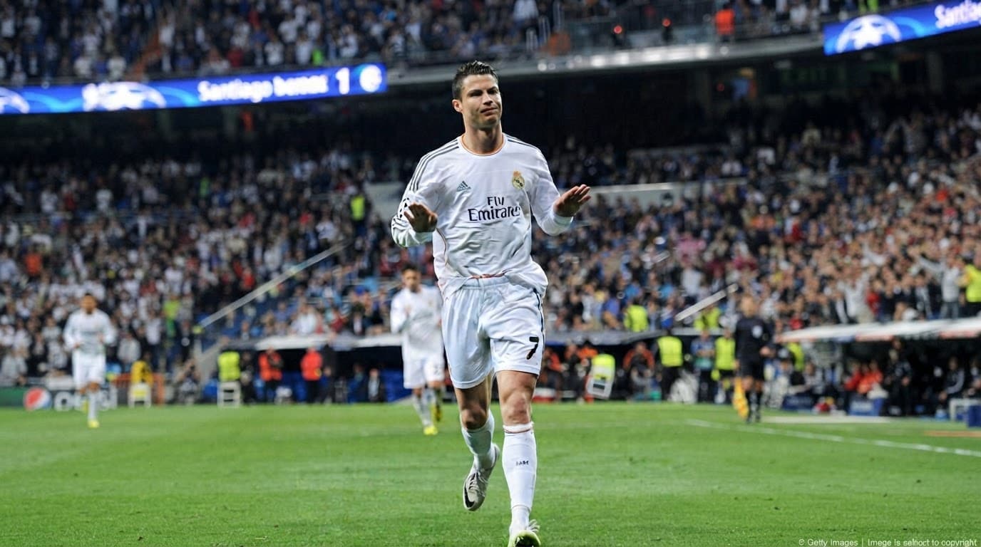 Cristiano Ronaldo running on the football pitch during a Real Madrid match