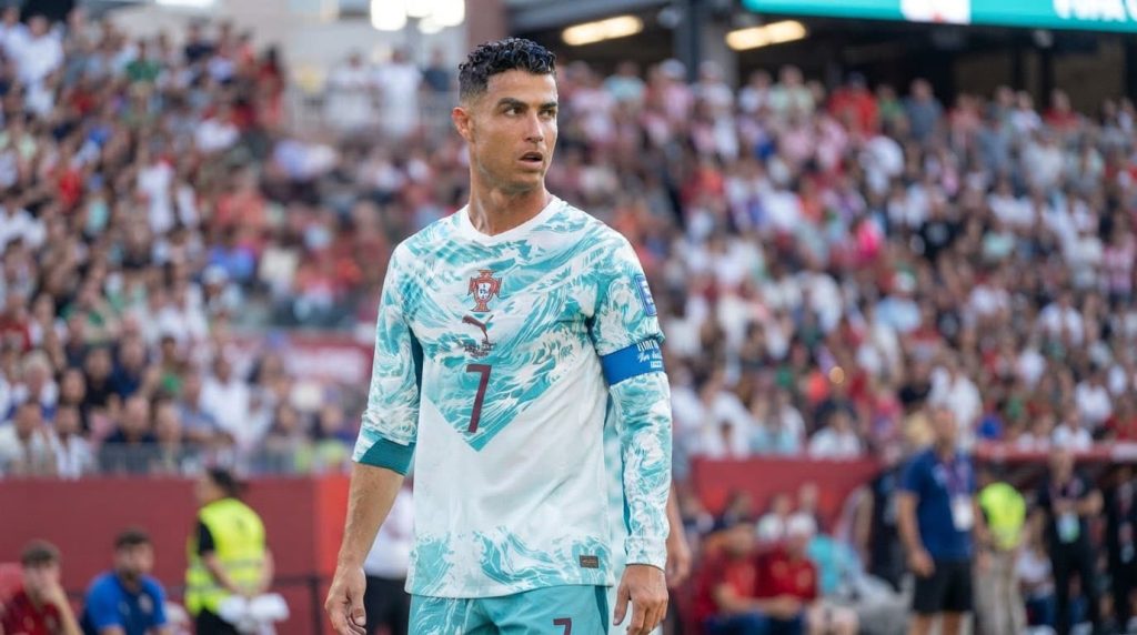Cristiano Ronaldo standing on the football pitch during a Portugal match in 2026