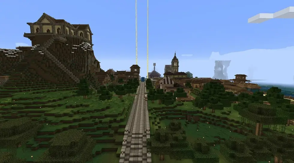 Pixelated Minecraft village with buildings on grassy hills under clear blue sky