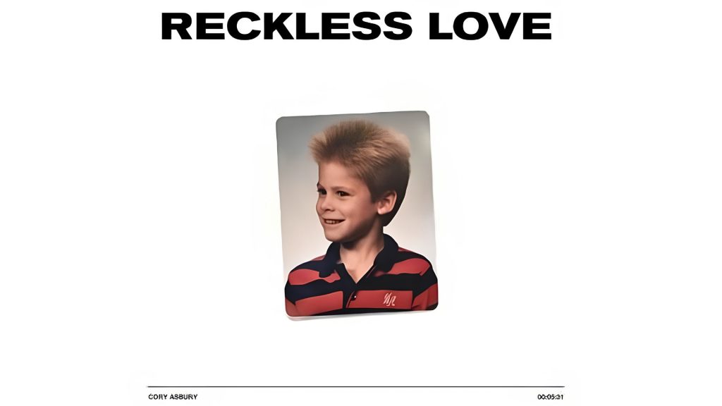 Album cover for "Reckless Love" by Cory Asbury featuring a child's portrait on a white background.