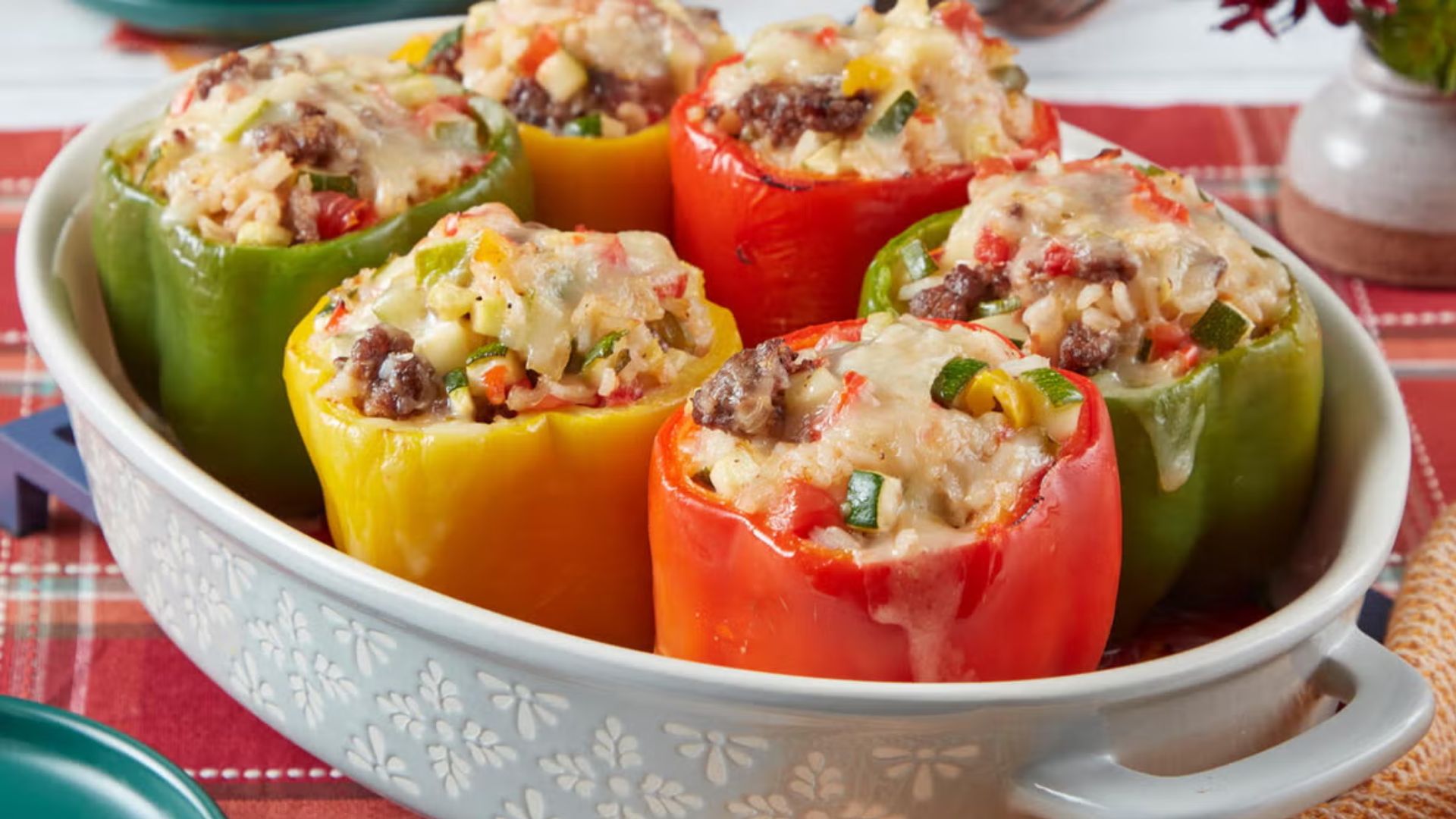 Roasted bell peppers stuffed with brown rice, lentils, tomatoes, spinach and lightly melted cheese.