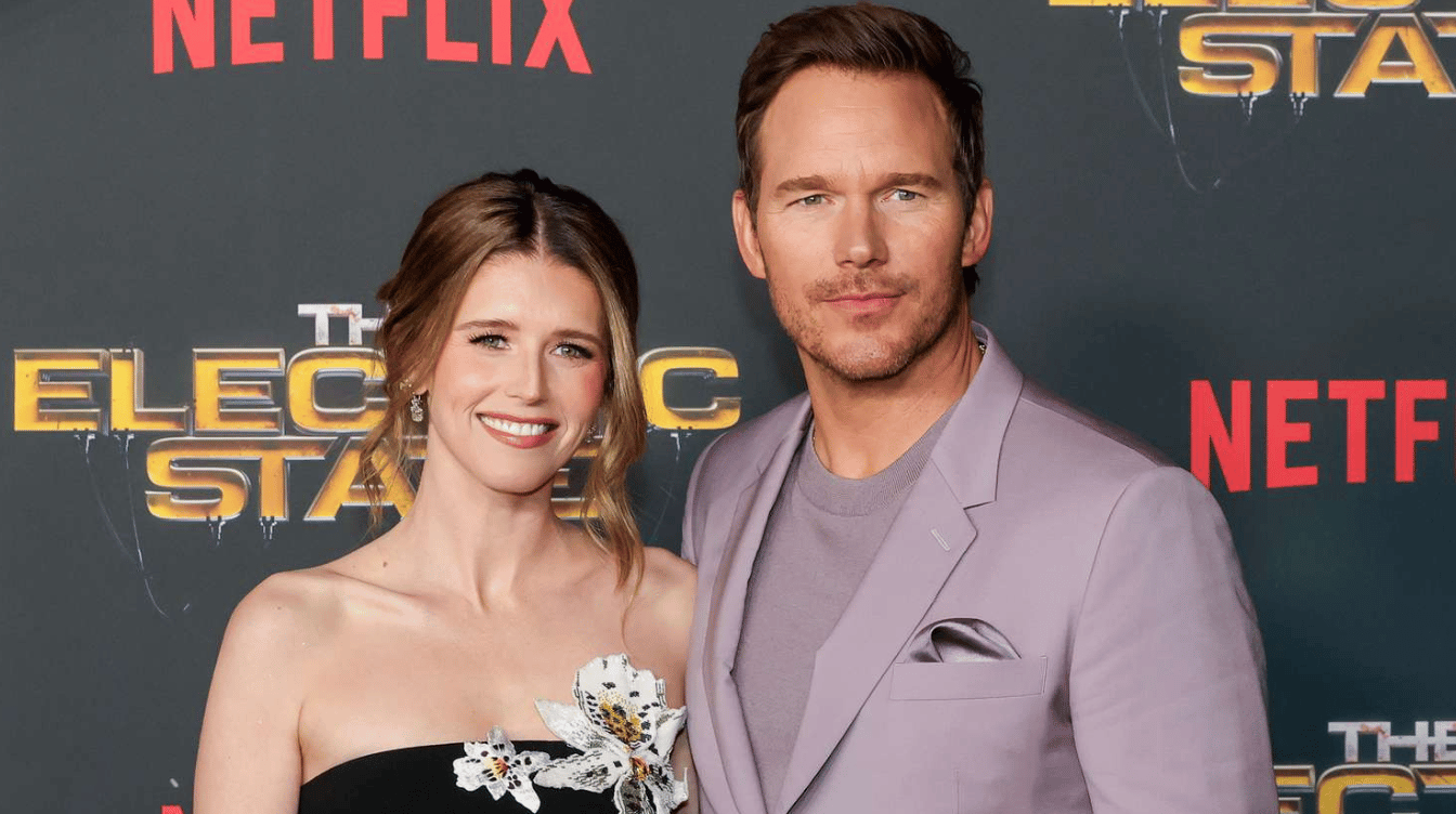 chris pratt and katherine schwarzenegger posing together at the electric state premiere red carpet event