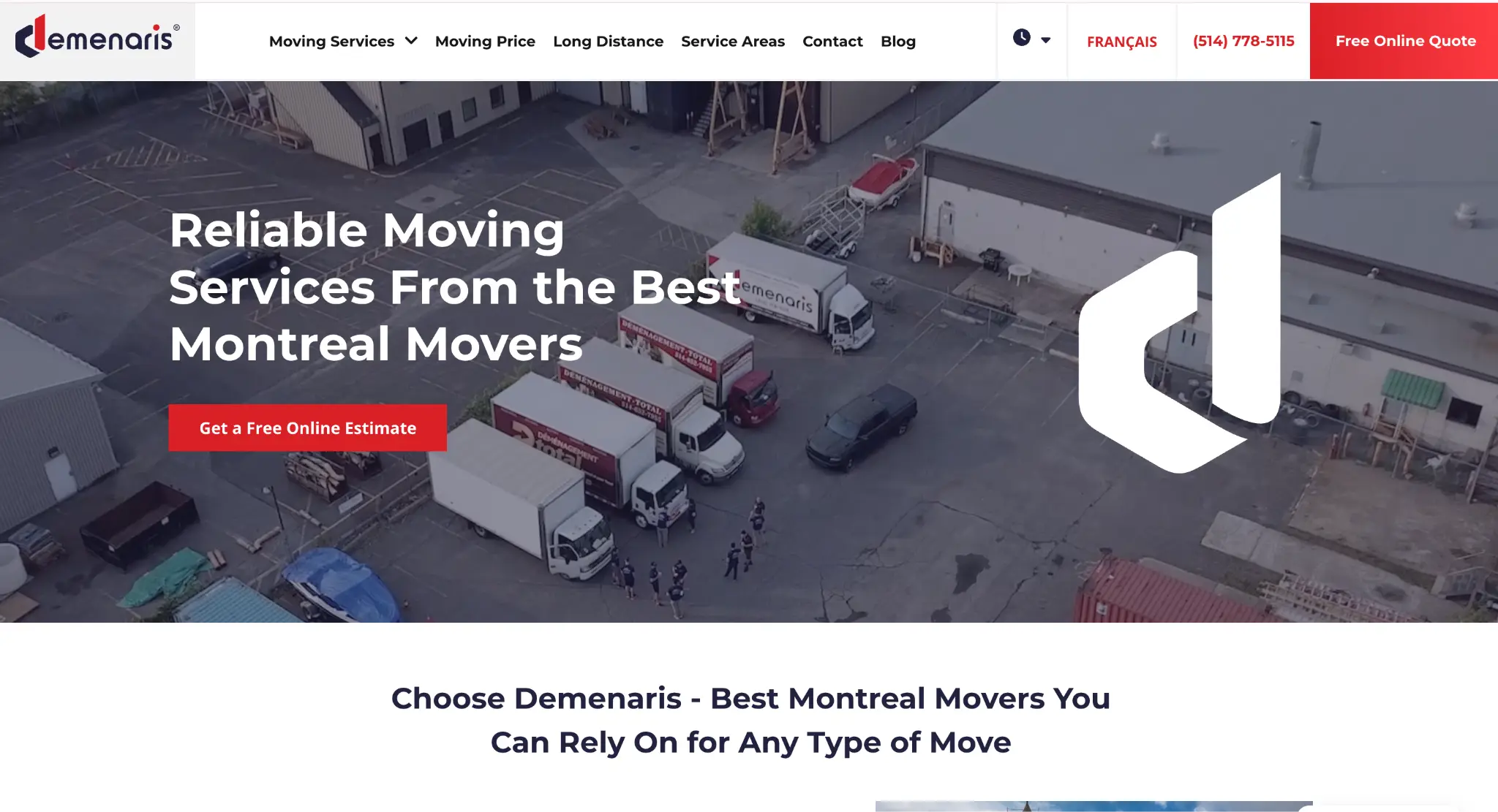 Five moving trucks parked in an industrial lot with people standing nearby